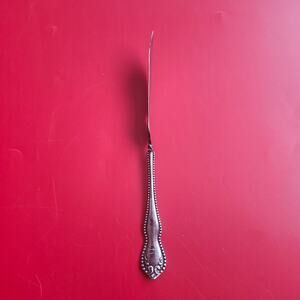 Holmes & Edwards International Silver Pearl 1898 Twisted Handle Butter Knife